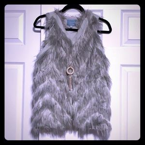 Faux fur vest.
